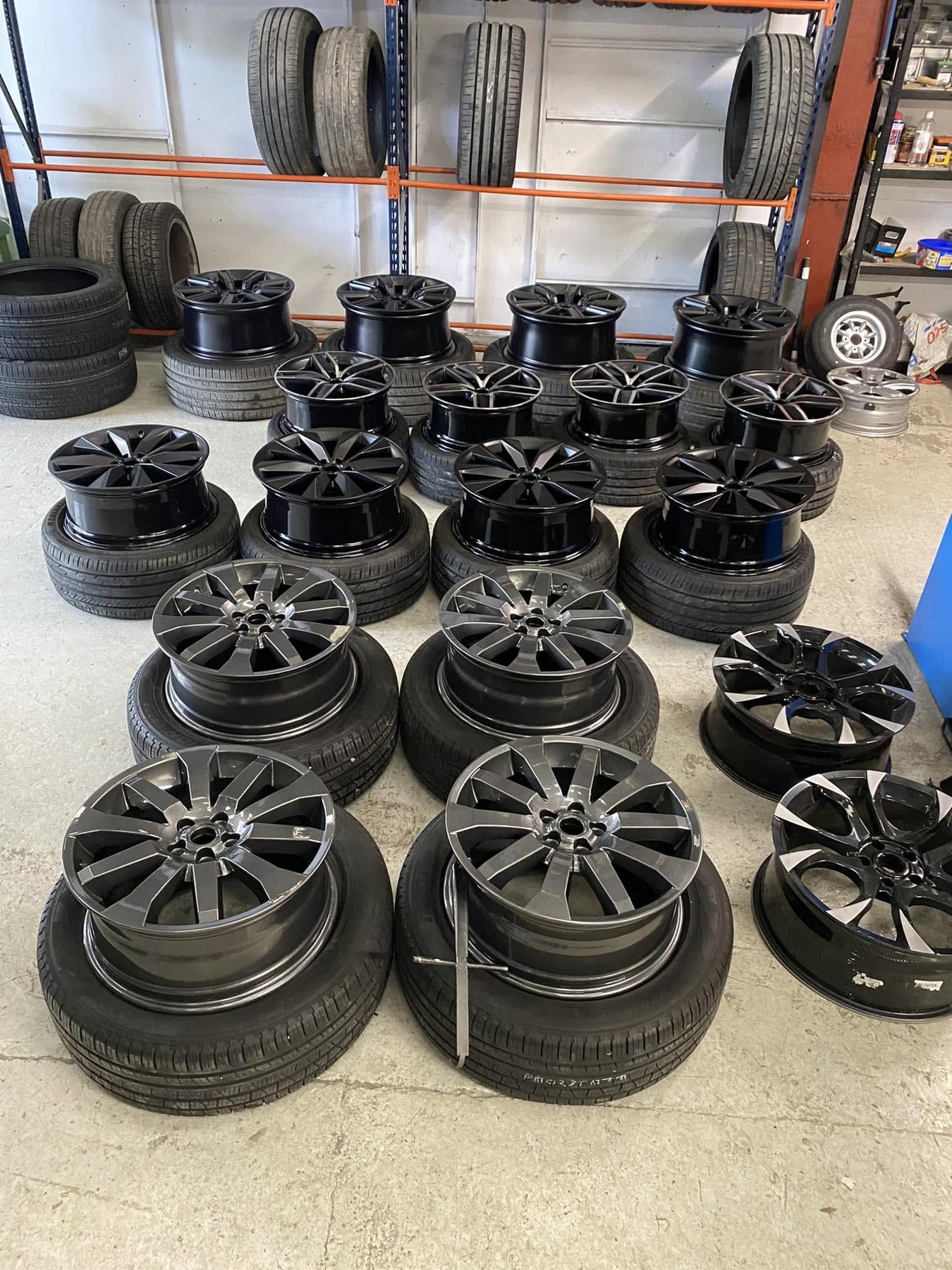 Row of finished alloy wheels in the WheelMaster workshop